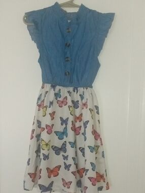 girl 5 dress blue top with butterfly print bottom